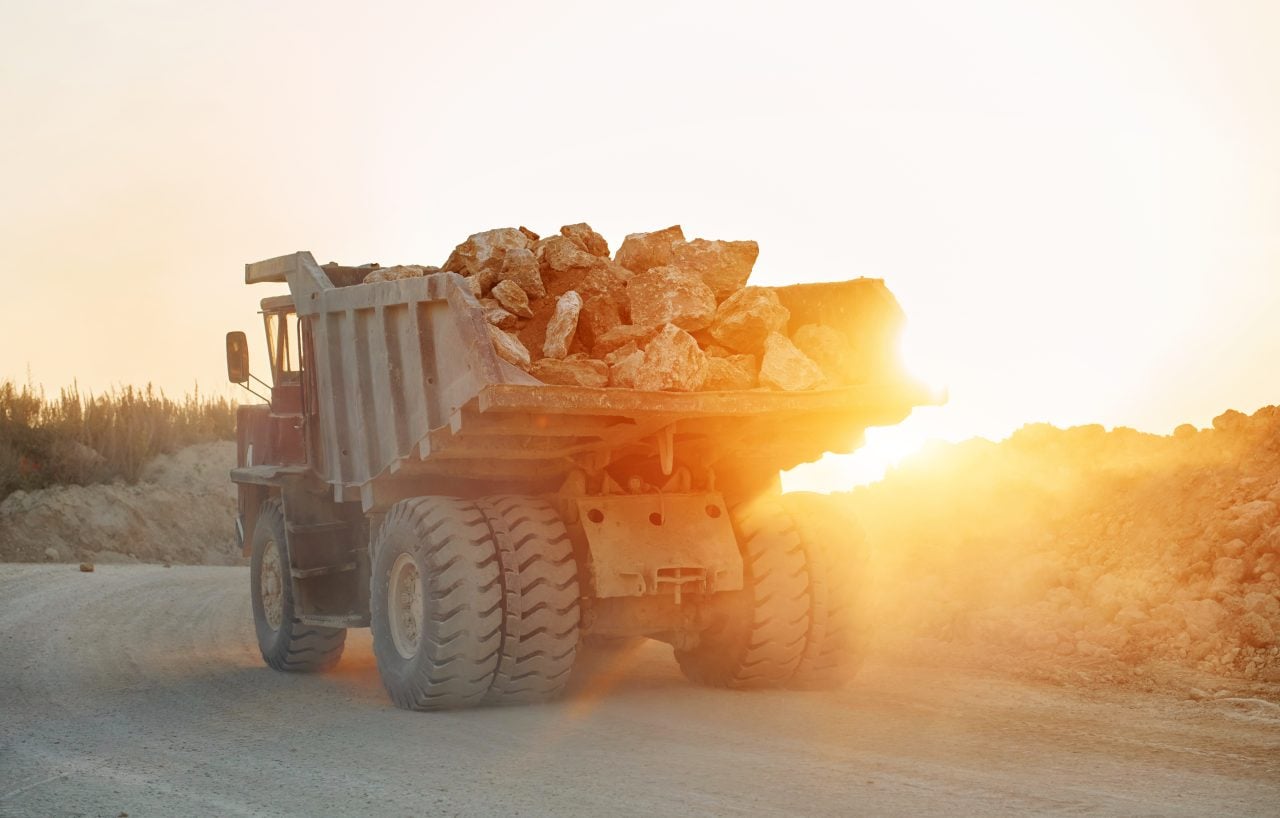 Haul truck carrying ore at a mine — CheMost mining and explosives chemicals